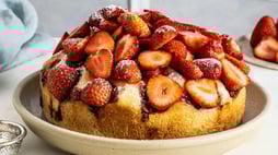 Strawberry Crunch Poke Cake with Choclairs Drizzle: A Festive Dessert